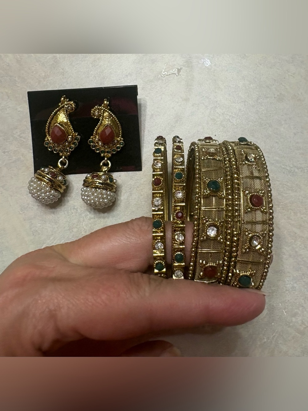 Earrings and 4 Bangle bracelets: GUC